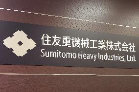 Sumitomo Heavy Industries signboard and logo
